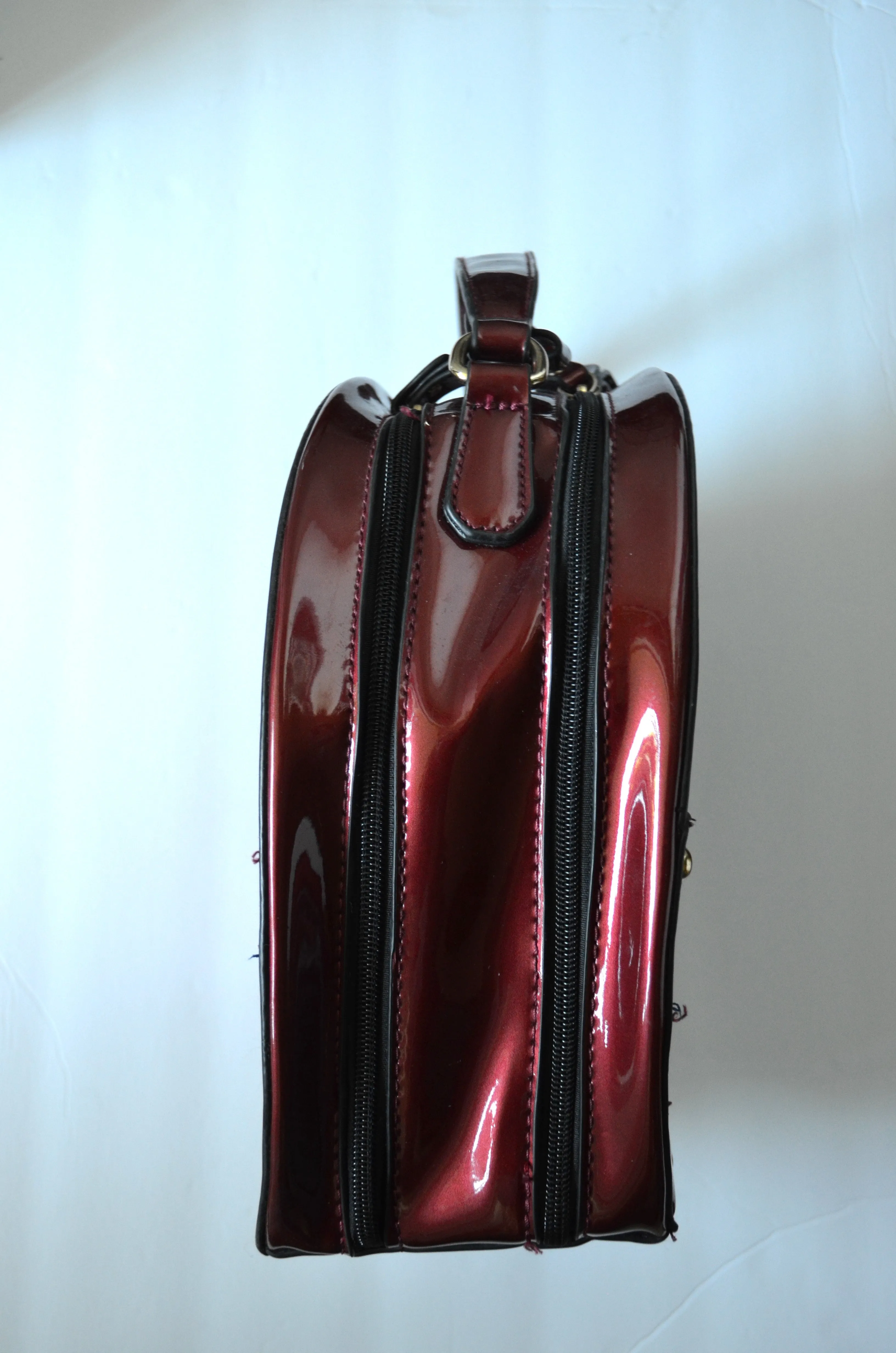 Round travel train case patent vegan leather merlot make up accessory case  purse Carry On